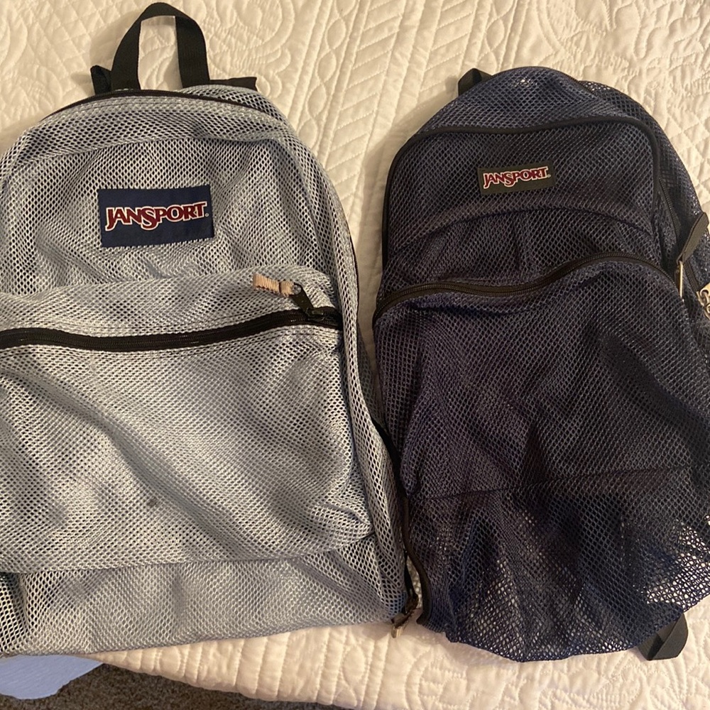 Set of two gently used Jan sport kids school backpacks mesh. One gray one black